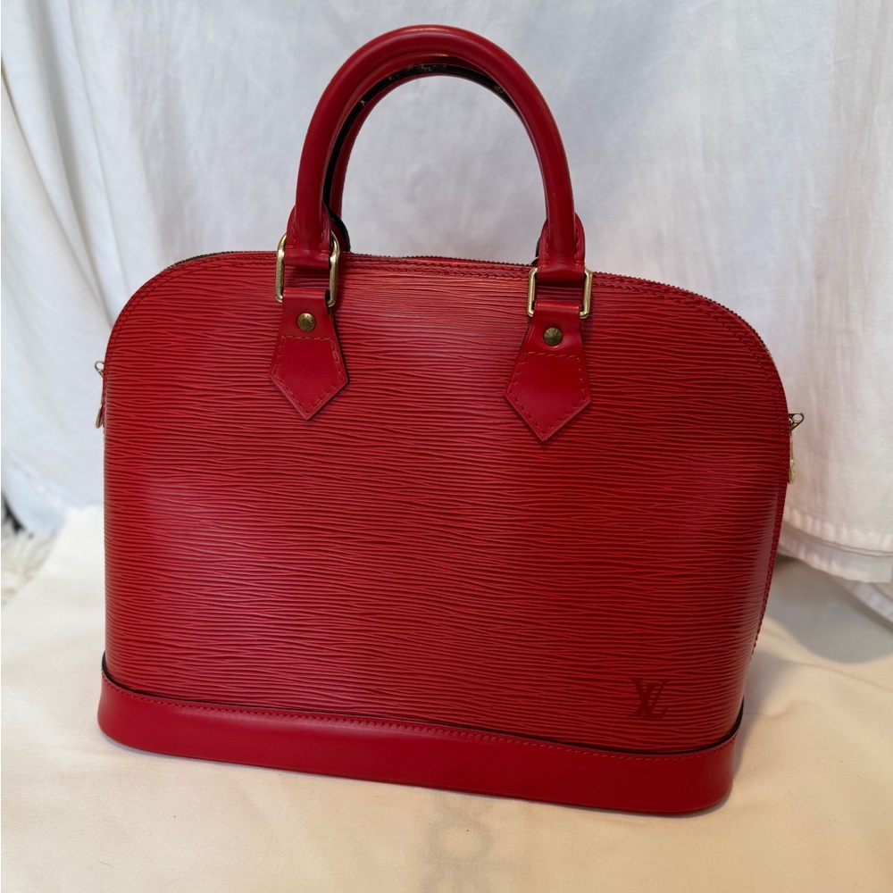 Louis Vuitton Alma PM Handbag in Red Epi Leather